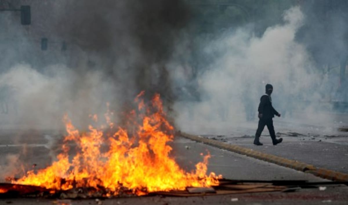 Disturbios presentados en el paro nacional de 48 horas en Chile. AP Luis Hidalgo