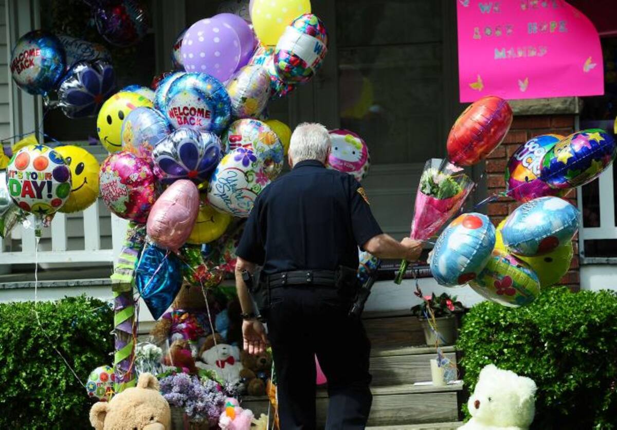 Amanda Berry, una de las tres mujeres secuestradas, regresó a su casa después de 10 años. AFP