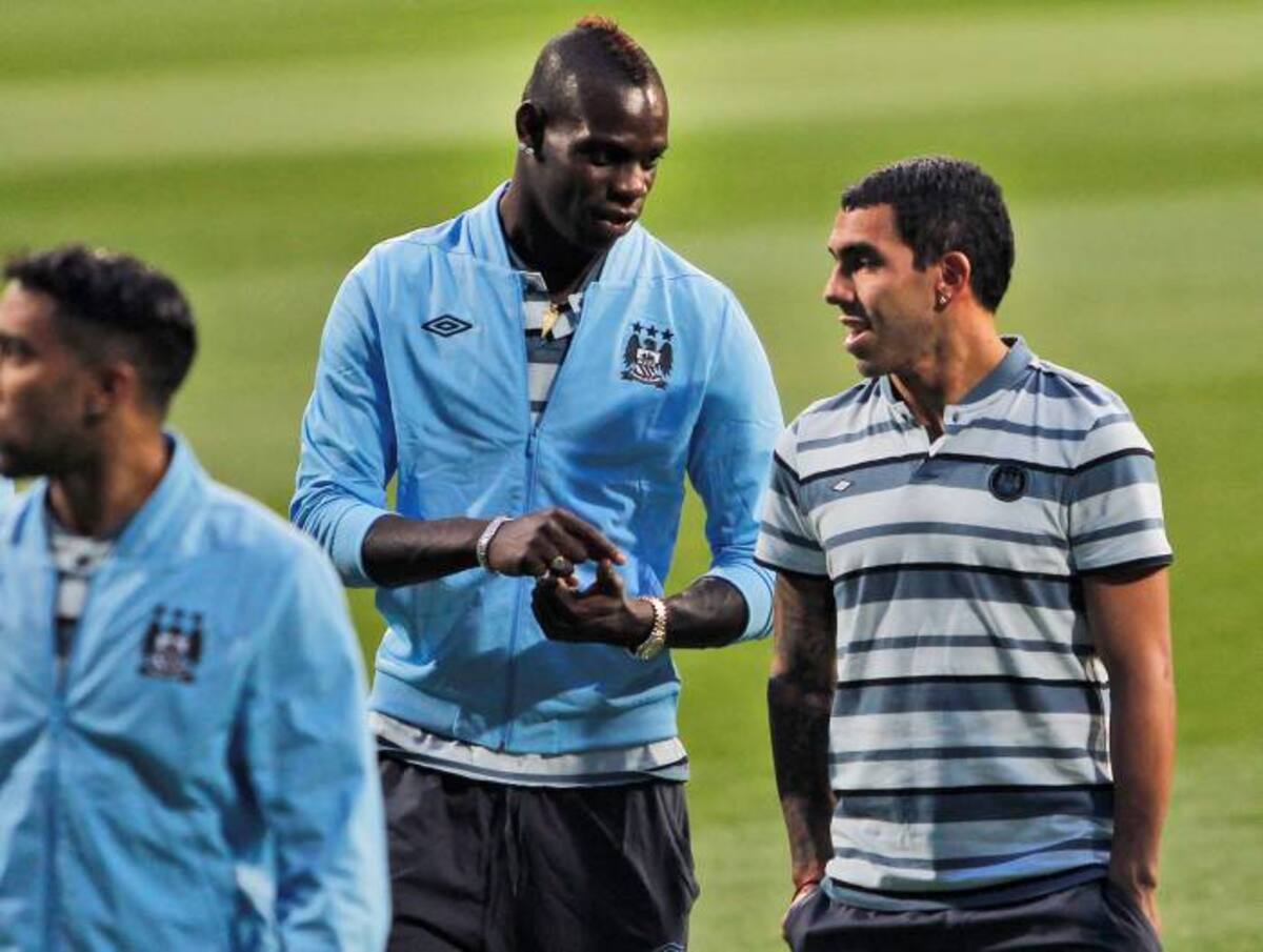 Mario Balotelly y Carlos Tévez confían en buen resultado del City. AFP