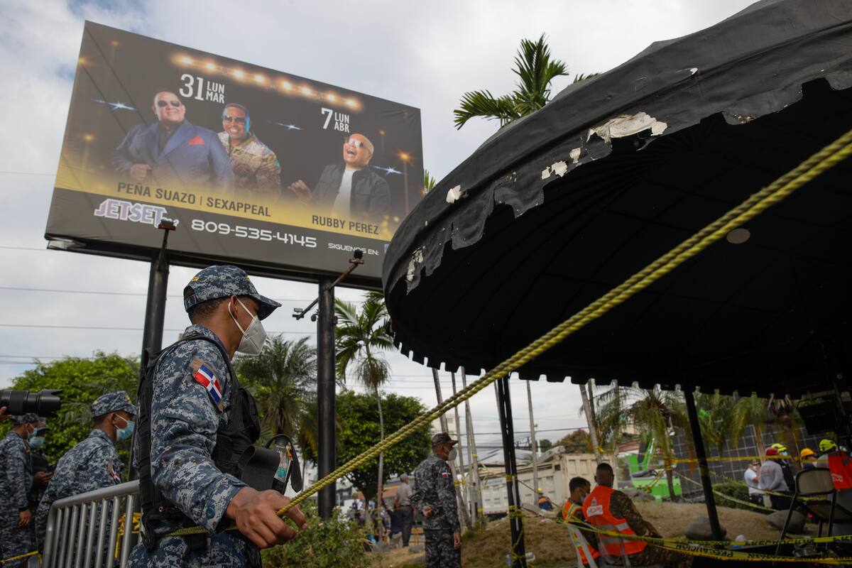 Cifran en 221 los muertos en discoteca de Santo Domingo a la espera de informe final. // Foto: EFE/ Orlando Barría