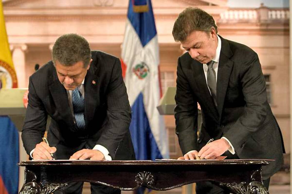 Leonel Fernández y Juan Manuel Santos AP William Fernando Martinez