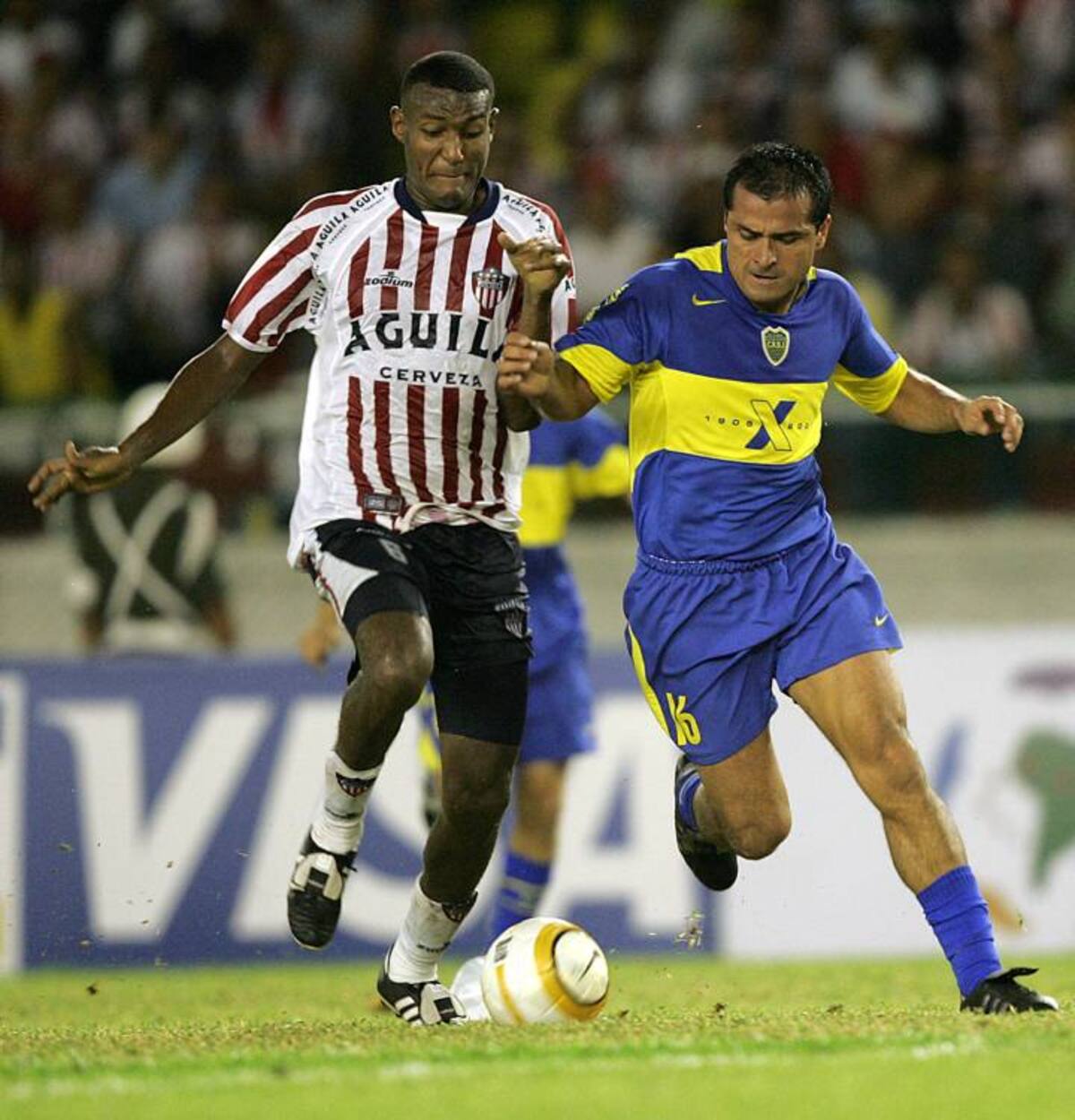 Cristian Racero (izquierda), futbolista asesinado.