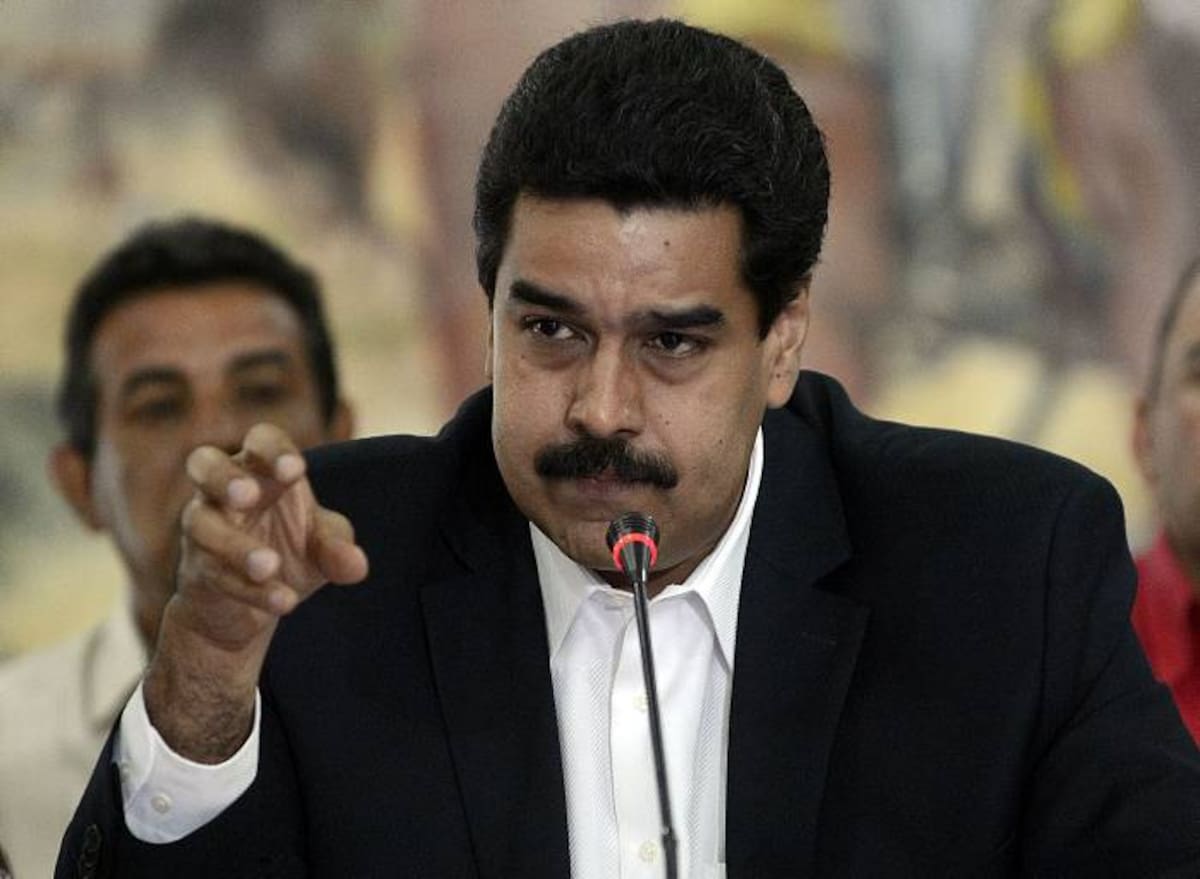 El Ministro de Relaciones Exteriores de Venezuela, Nicolás Maduro, habla durante una conferencia de prensa en Caracas el 2 de mayo de 2012. AFP PHOTO/JUAN BARRETO