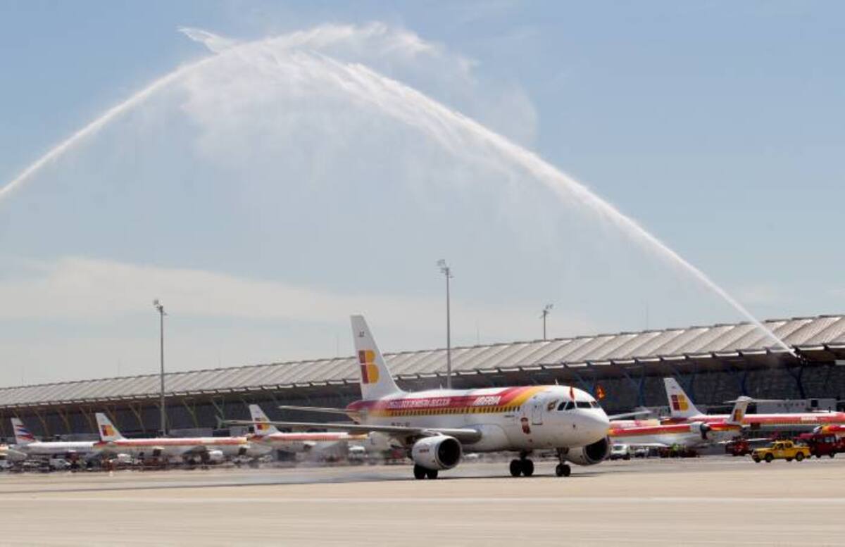 Bienvenida a los campeones a su llegada a Madrid. AP