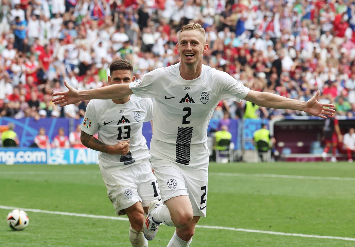 Zan Karnicnik de Eslovenia celebra marcar el gol inicial 1-0 durante el partido de fútbol del Grupo C de la UEFA EURO 2024 entre Eslovenia y Serbia, en Munich, Alemania, el 20 de junio de 2024. //EFE