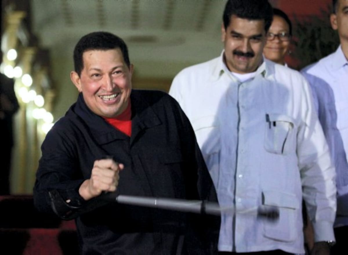 Hugo Chávez y Nicolás Maduro. AP ARIANA CUBILLOS