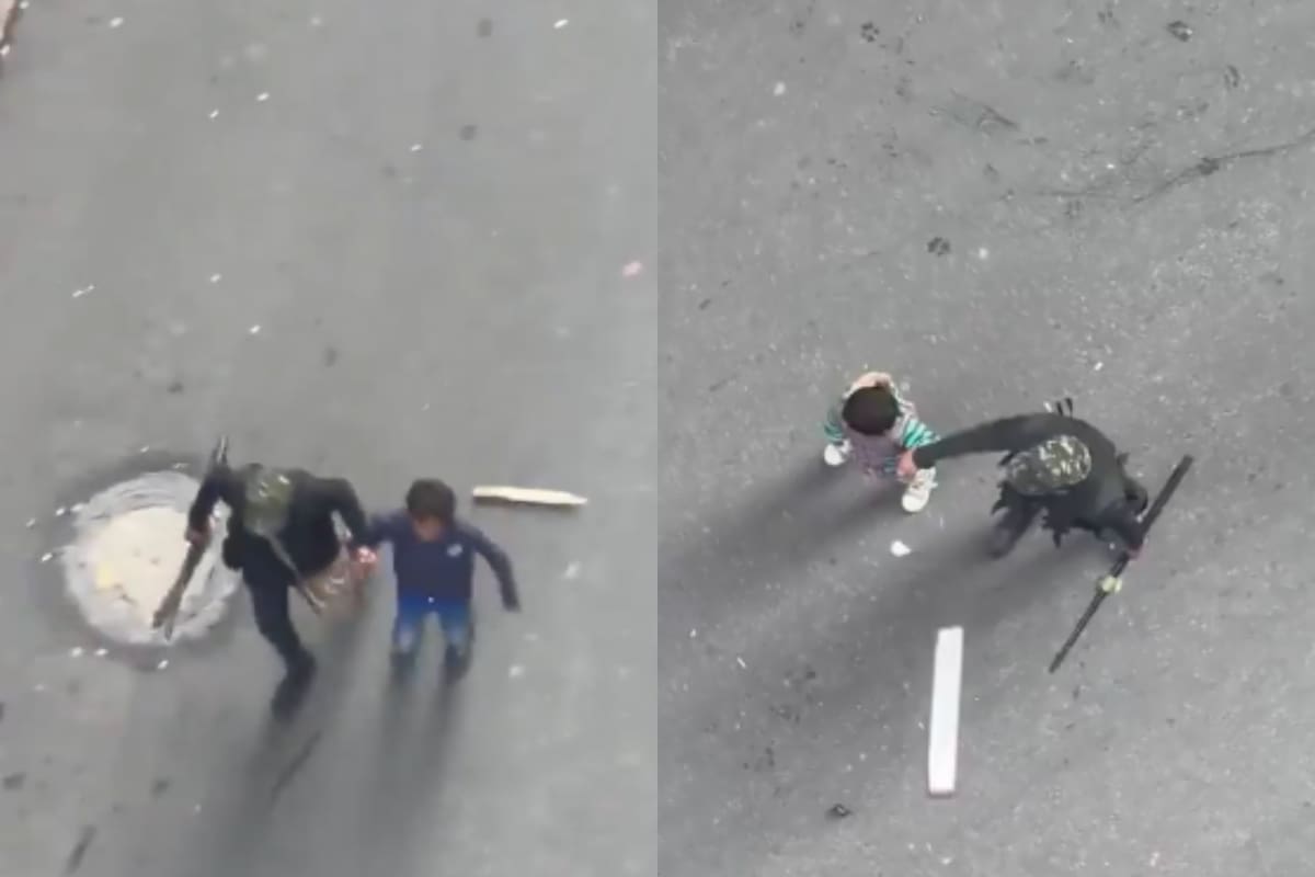 Indígenas usan a niños como escudos en enfrentamiento contra escuadrón antidisturbios en Bogotá. // Foto: captura de video.
