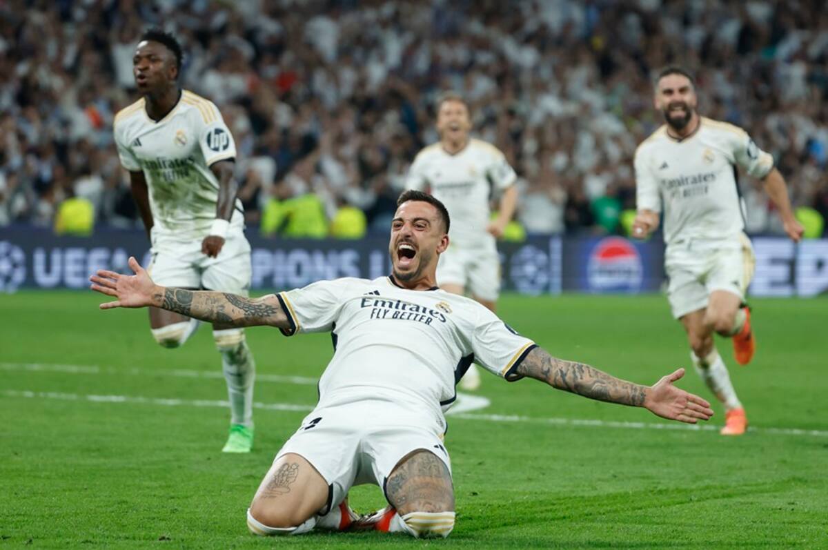El delantero del Real Madrid, Joselu, celebra el segundo gol del equipo madridista frente al Bayern en la última remontada -en un mismo partido- del equipo español. //EFE