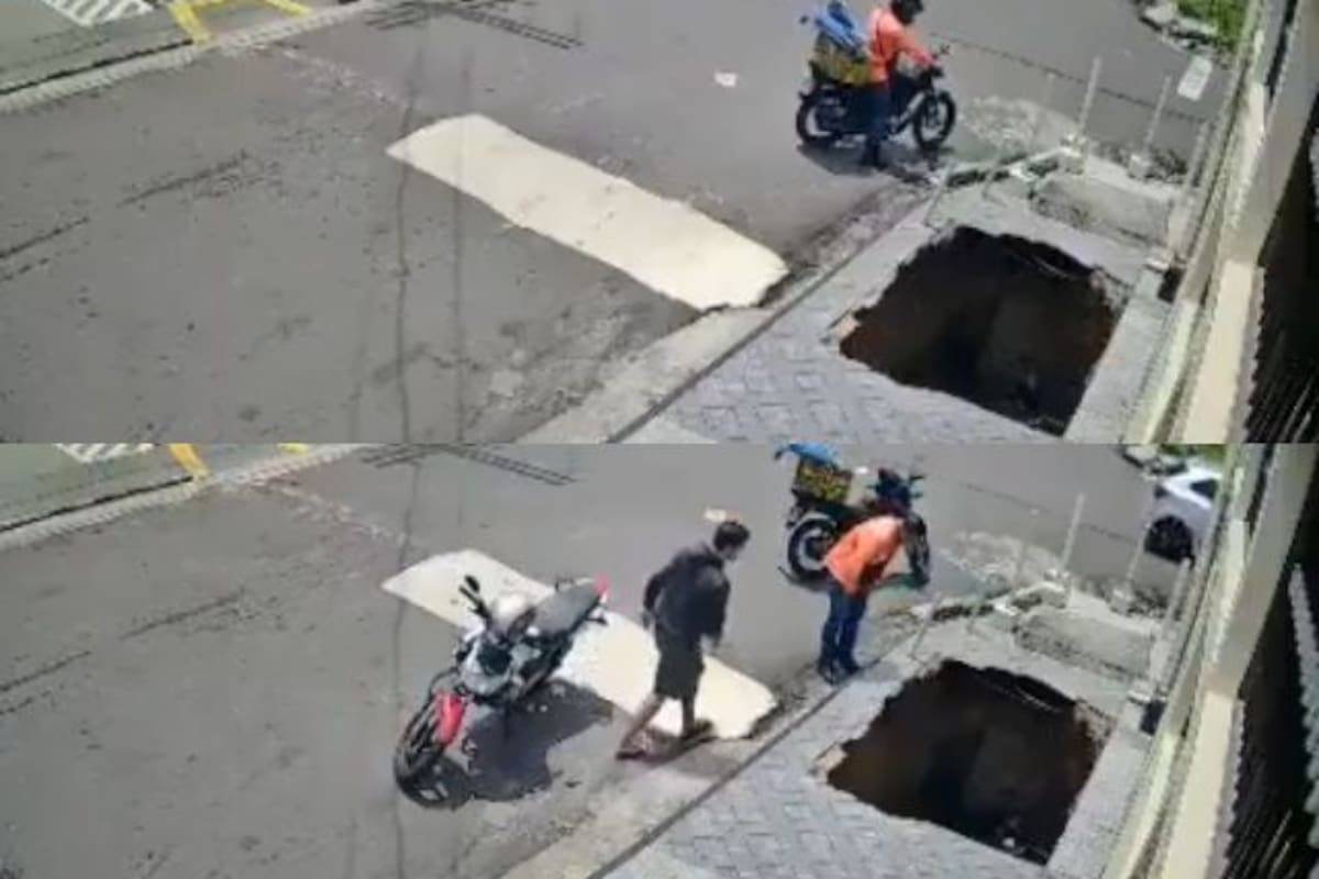 Impactante video: joven caminaba por una acera y un hueco se lo tragó