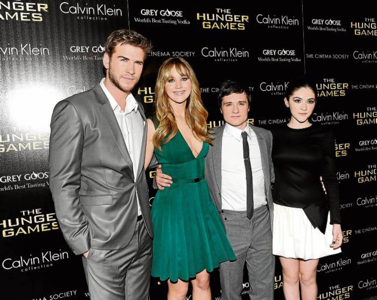 El elenco de Los Juegos del Hambre: Liam Hemsworth, Jennifer Lawrence, Josh Hutcherson e Isabelle Fuhrman. AP /Evan Agostini/