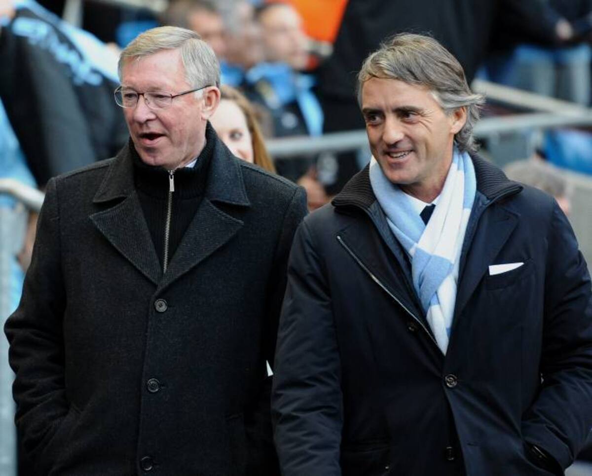 Alex Ferguson y Roberto Mancini AFP PAUL ELLIS