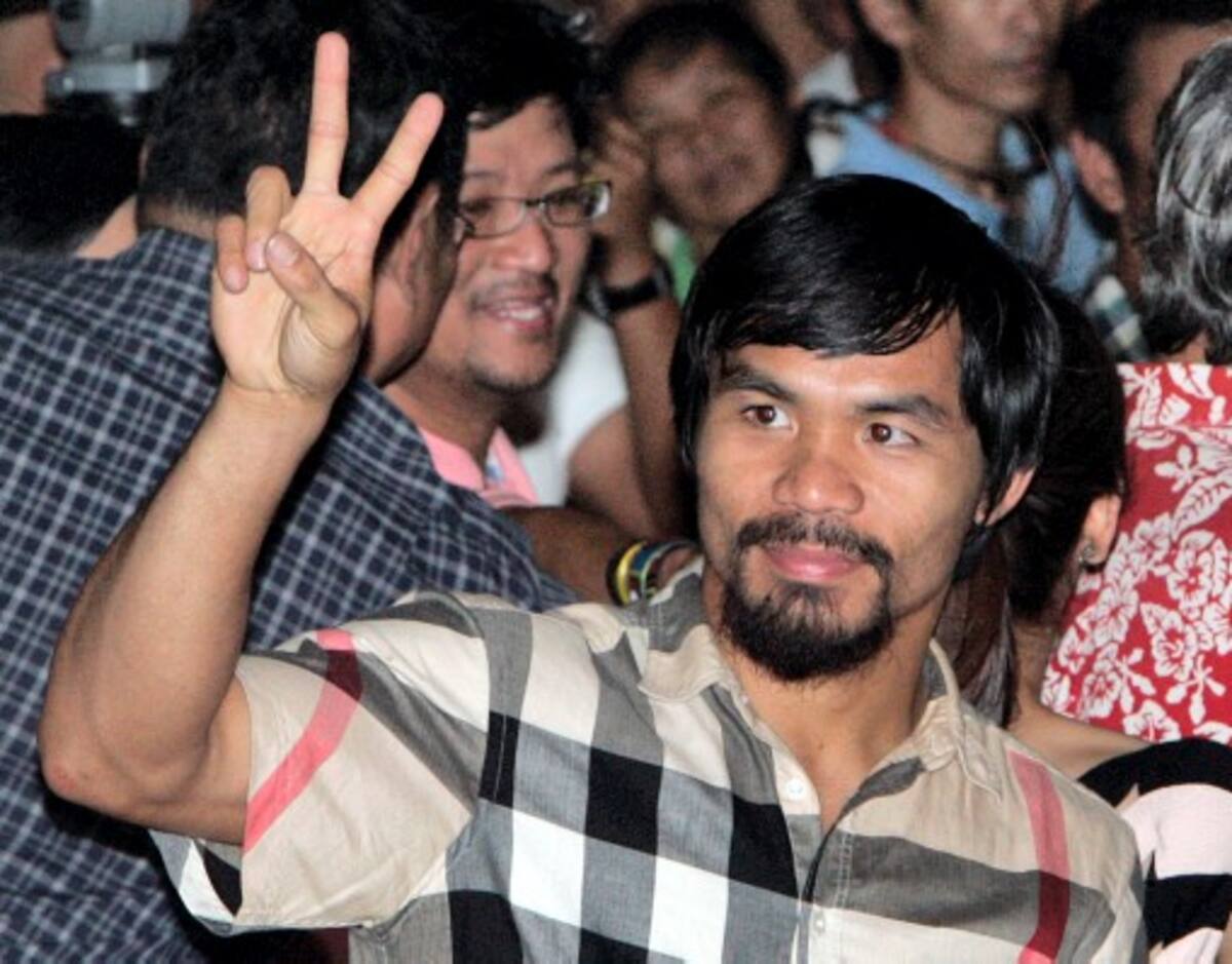 Manny Pacquiao sigue en litigio con Floyd Mayweather Jr. AFP