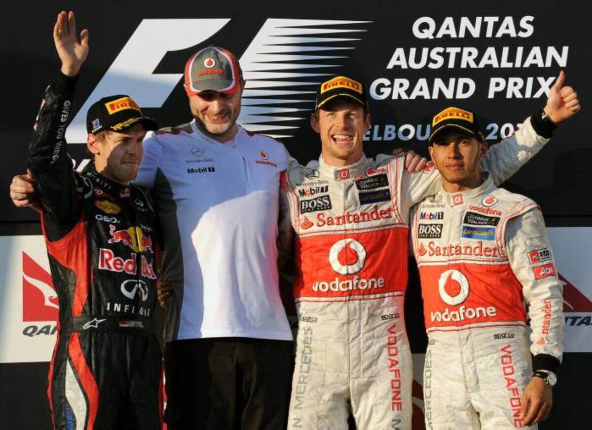 El británico Jenson Button terminó por delante del alemán Sebastian Vettel (Red Bull) y de su compatriota y compañero en McLaren, Lewis Hamilton. AFP TORSTEN BLACKWOOD