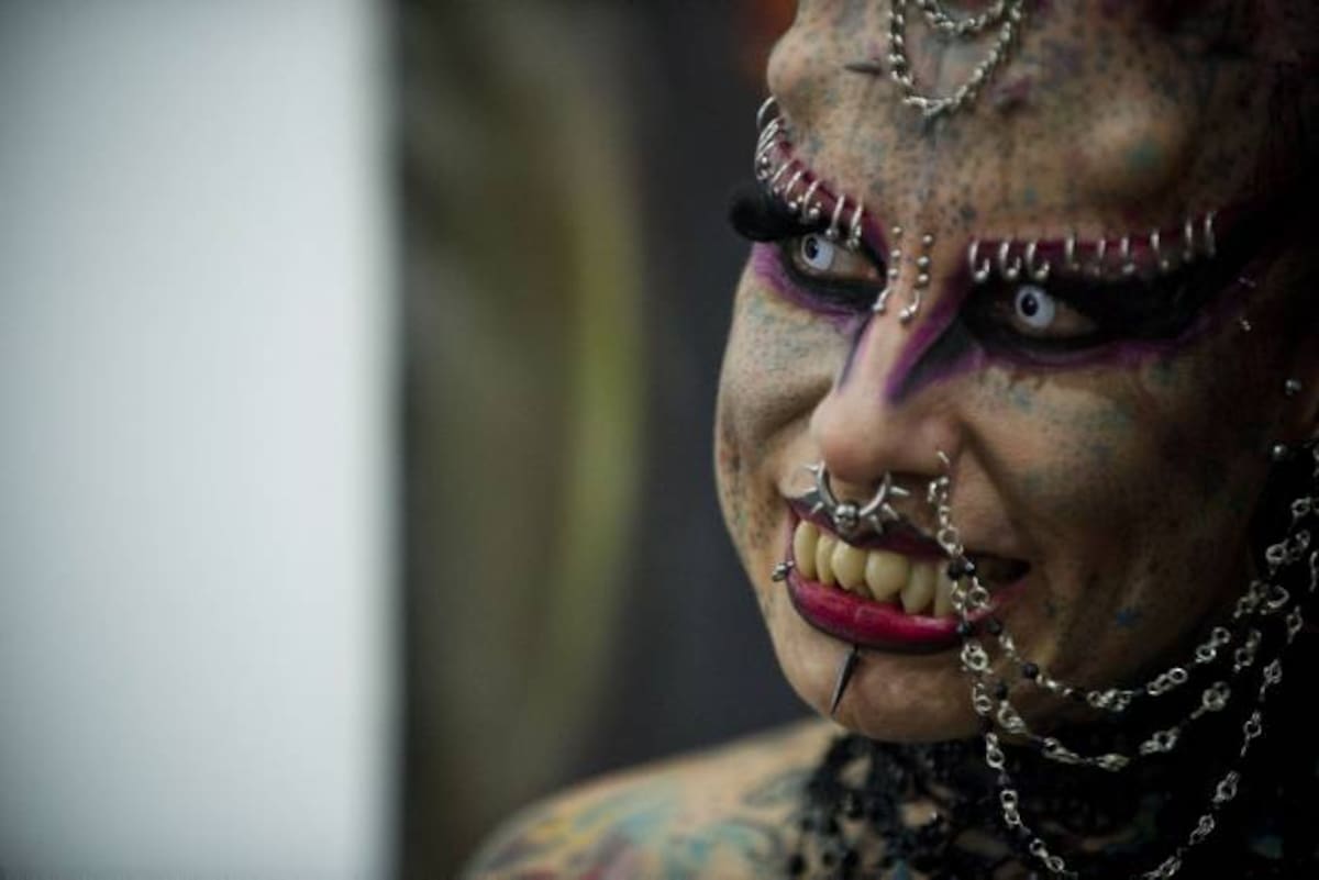 Mexican Mary Jose Cristerna aka "The Vampire Woman" poses during the Venezuela Expo Tattoo 2012 in Caracas, on January 28, 2012. Over 200 tattoo artists from countries such as Venezuela, Argentina and Mexico gather in Caracas to show this art, which also uses implants in the face and cuts in the skin. AFP PHOTO/Leo RAMIREZ