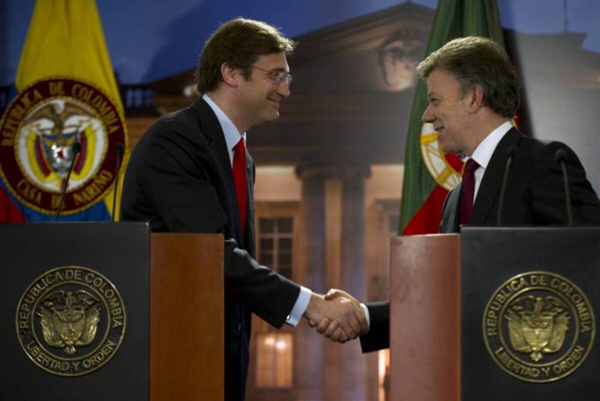Pedro Passos Coelho, primer ministro de Portugal y Juan Manuel Santos, presidente de Colombia. AFP EITAN ABRAMOVICH