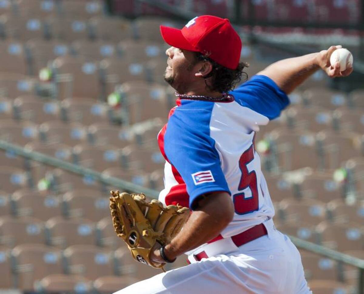 Nelson Figueroa llevó este jueves a Puerto Rico a su primer triunfo en la Serie del Caribe al derrotar 3-1 a Venezuela. AFP