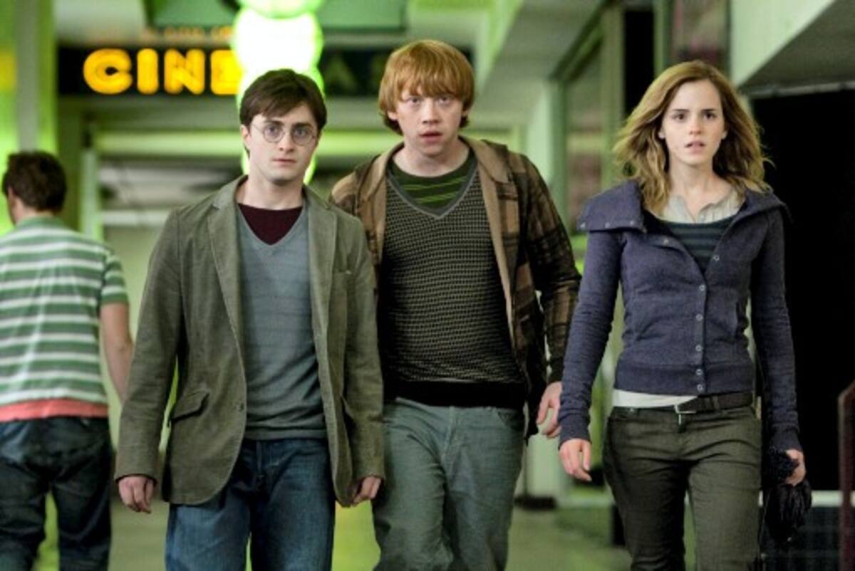 En la gráfica, Daniel Radcliffe como Harry Potter; Rupert Grint como Ron Weasley y Emma Watson como Hermione. AP JAAP BUITENDIJK