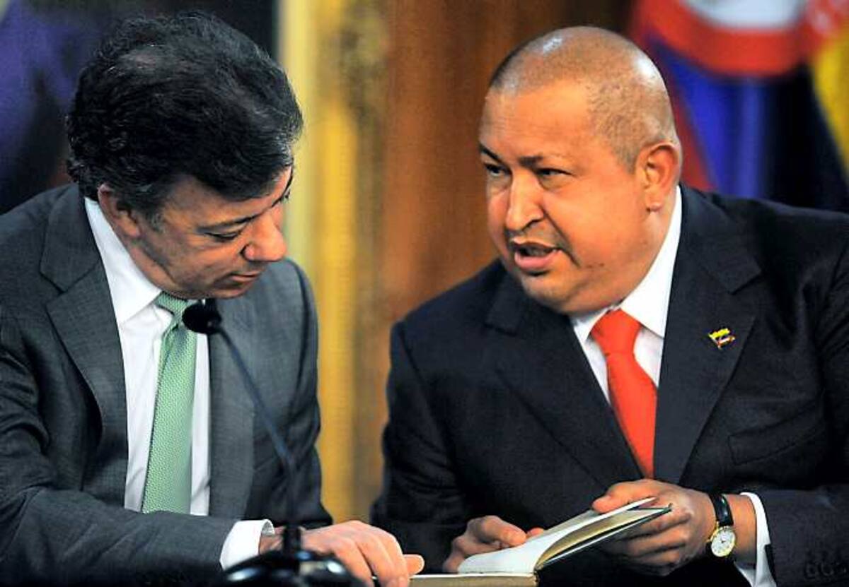 Hugo Chávez y Juan Manuel Santos AFP JUAN BARRETO