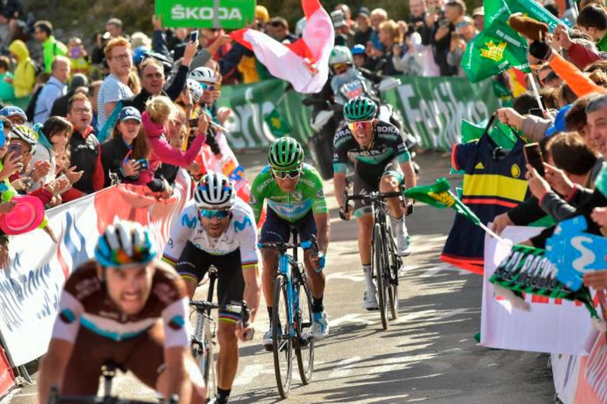 Sam Bennett gana la etapa 14 en un esprint accidentado